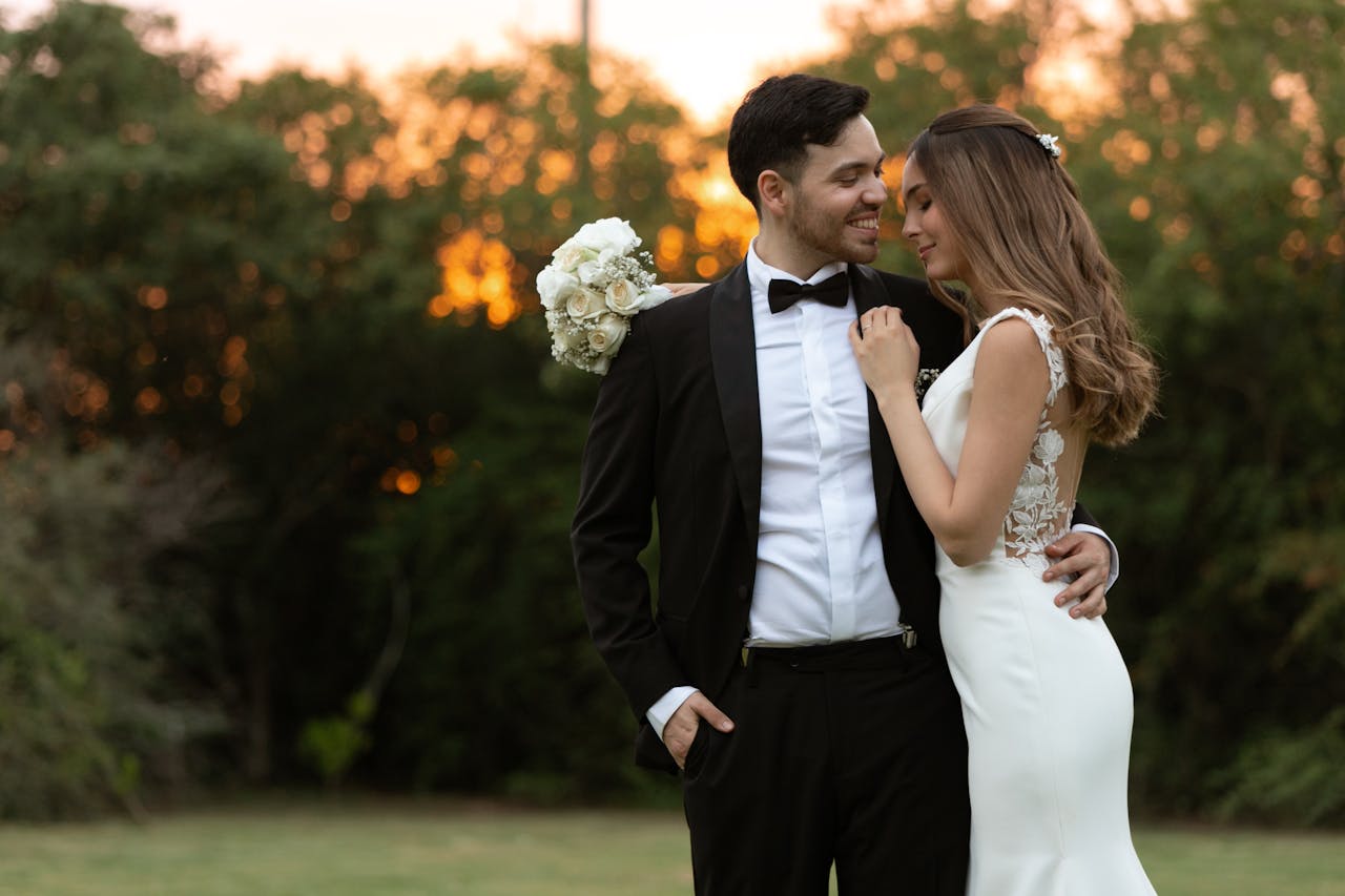 Lovely bride and groom embracing outdoors at sunset in Córdoba, Argentina, embracing romance.